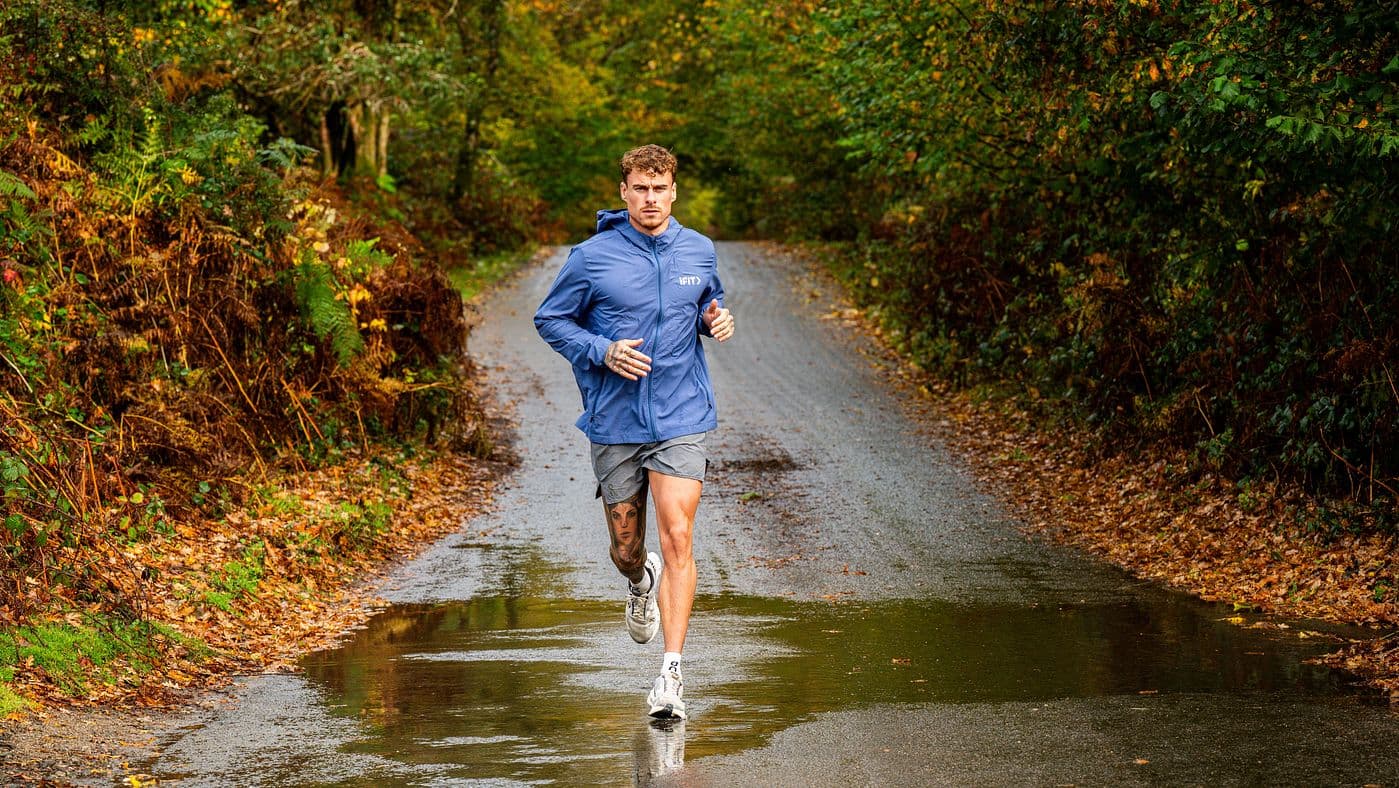 iFIT trainer and Trainer Games winner Kori Sampson runs during an outdoor training session featured in progressive running programs on the iFIT platform.