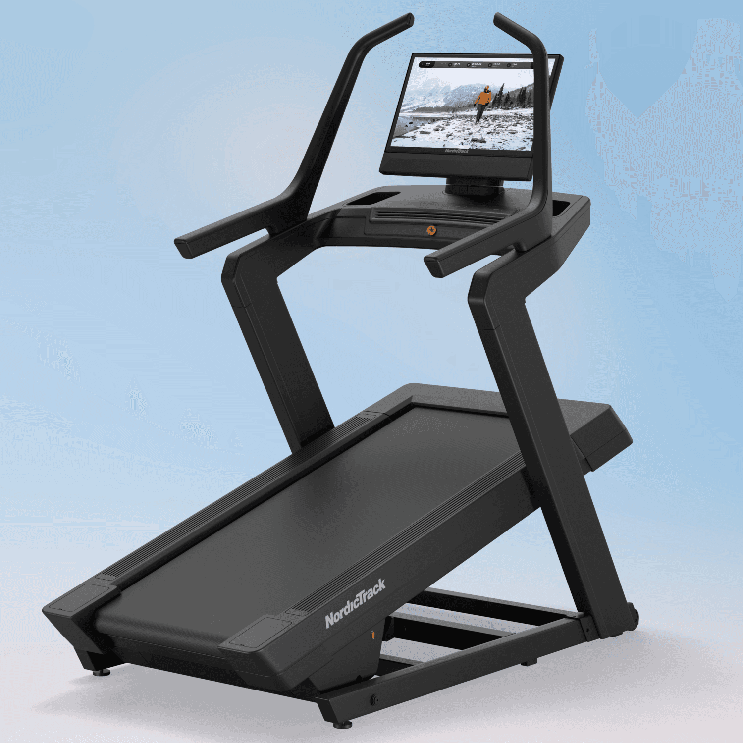 The X24 Treadmill positioned at an incline on a blue backdrop showcasing winter workout content on its 24" touchscreen.