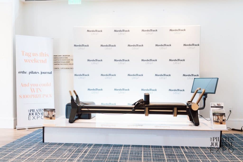 NordicTrack Ultra reformer displayed at the Pilates Journal Expo, highlighting connected reformer innovation and modern studio design.