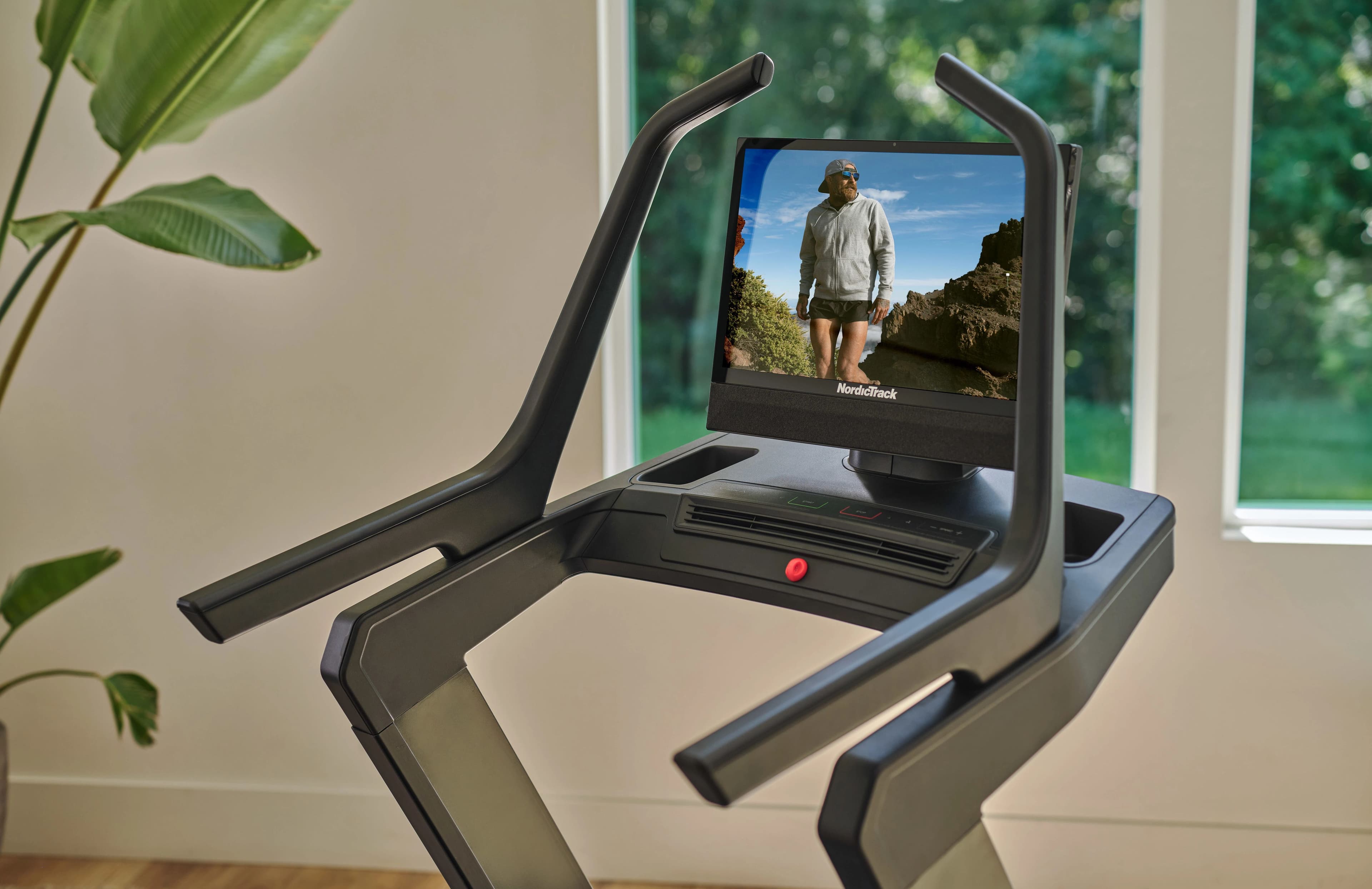 24-inch touchscreen on NordicTrack smart treadmill displaying immersive iFIT workout