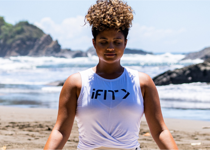 iFIT Trainer Meditating in Nature to Decrease Stress Levels