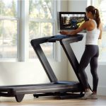 Woman Using an iFIT Workout at Home on Her NordicTrack Treadmill