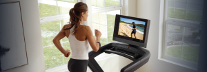 Woman Running on Her NordicTrack Treadmill During Back-to-School Time to Stay on Top of Her Health and Fitness Goals