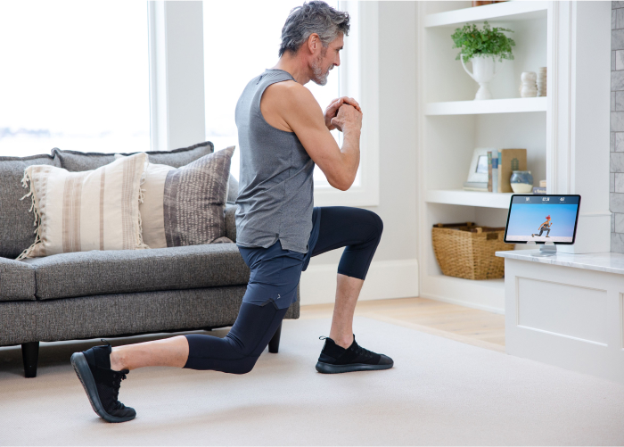 Older Man Practicing a HIIT Workout with an iFIT Trainer