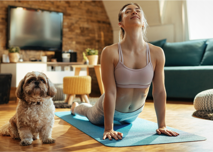 Woman Practicing Upward Facing Dog Yoga Move