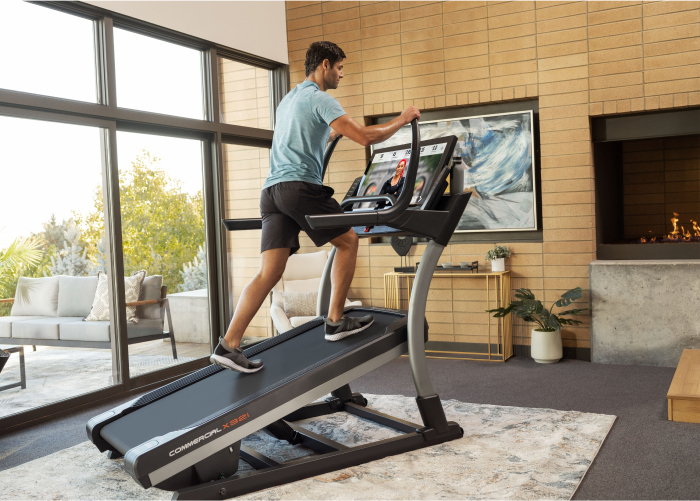 Man Exercising on NordicTrack Incline Treadmill Commercial X32i