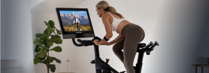 Woman Riding Her NordicTrack Exercise Bike for the Article on How Biking Can Make You Run Faster
