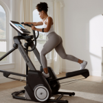 Woman Exercising on One of NordicTrack’s Elliptical Models
