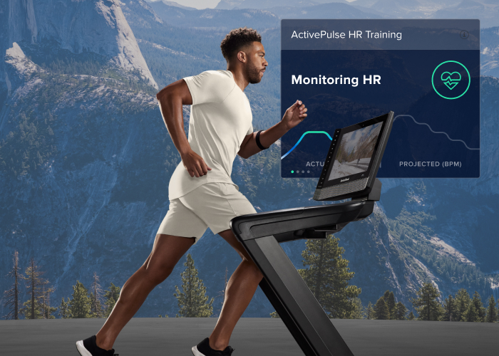 Man Running with iFIT's ActivePulse™ Heart Rate Training