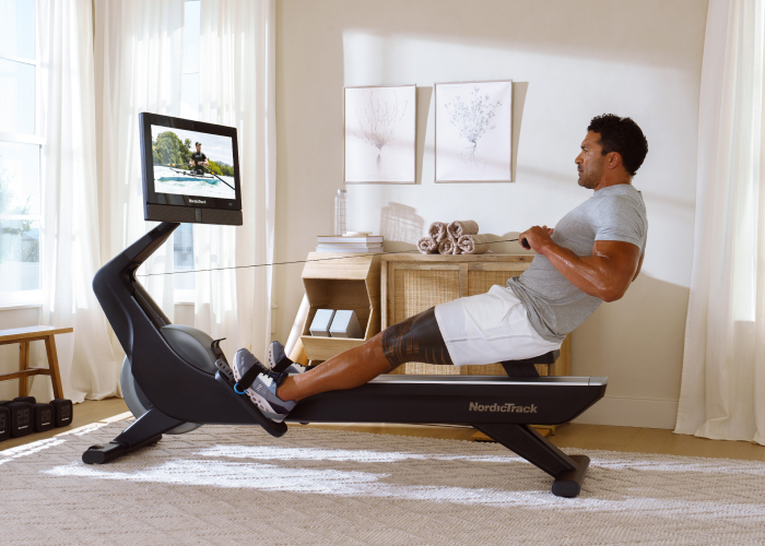 Man Using a NordicTrack Rower to Get in Shape