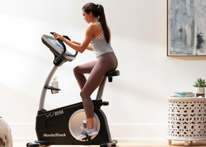 Woman Riding a NordicTrack Upright Stationary Bike