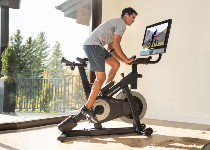 Man Riding a NordicTrack Studio-Style Stationary Exercise Bike