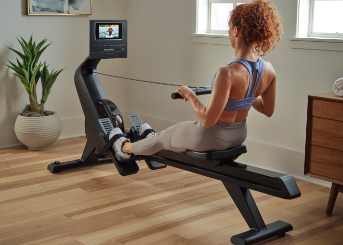 Woman Using a NordicTrack Rower for a Full Body Workout