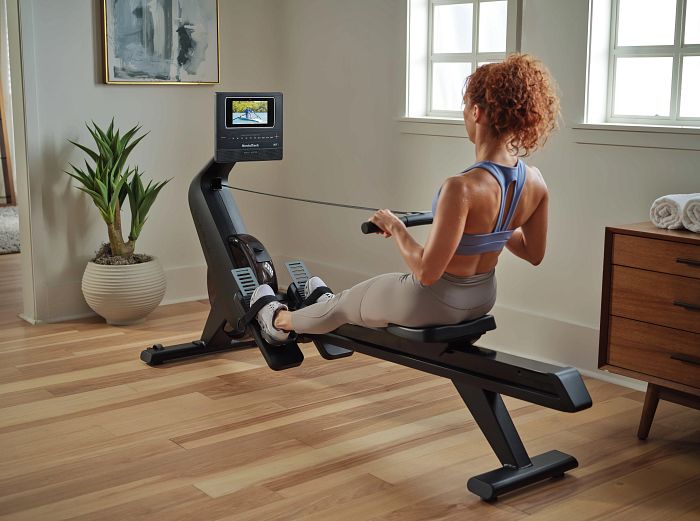 Woman Using a NordicTrack Rower for the Rowing Machine Buying Guide