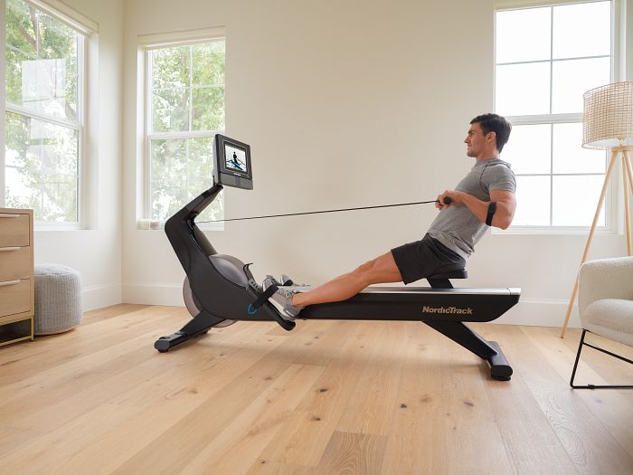 Man Using the Best Rower Overall - NordicTrack RW700 Rowing Machine